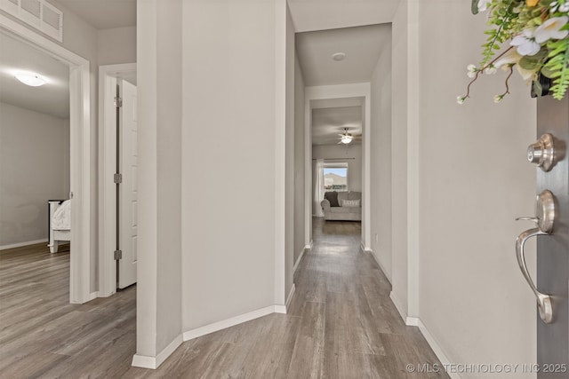 13009 E 124th Ct, Collinsville, OK 74021 - hallway with wood finished floors