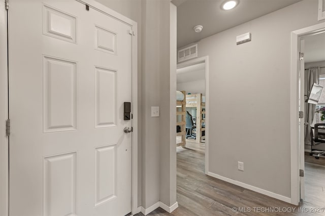 13009 E 124th Ct, Collinsville, OK 74021 - entryway with wood finished floors and recessed lighting