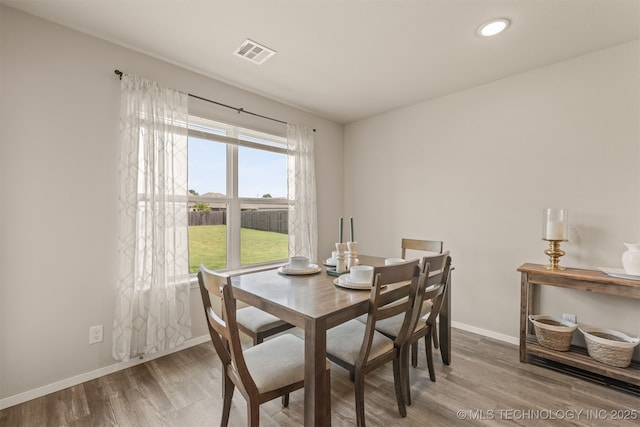 13009 E 124th Ct, Collinsville, OK 74021 - dining space featuring wood finished floors and recessed lighting