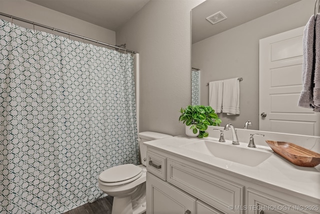 13009 E 124th Ct, Collinsville, OK 74021 - full bathroom with vanity, wood finished floors, and a shower with curtain