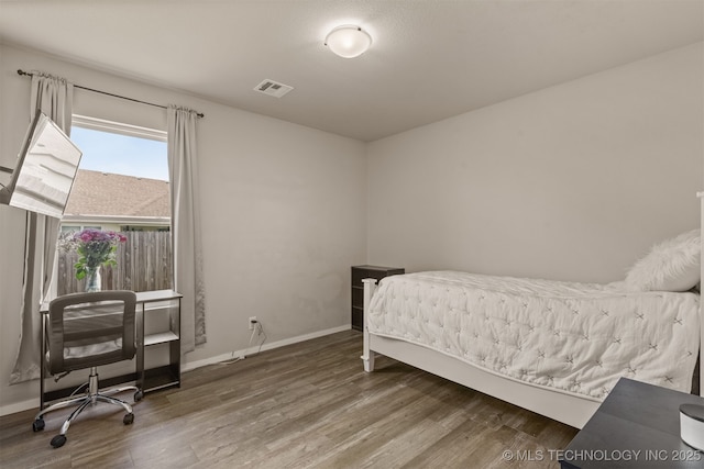 13009 E 124th Ct, Collinsville, OK 74021 - bedroom featuring wood finished floors and an office area