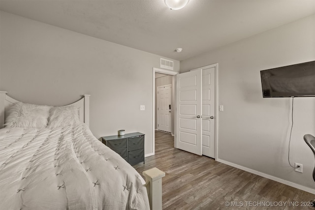 13009 E 124th Ct, Collinsville, OK 74021 - bedroom with wood finished floors