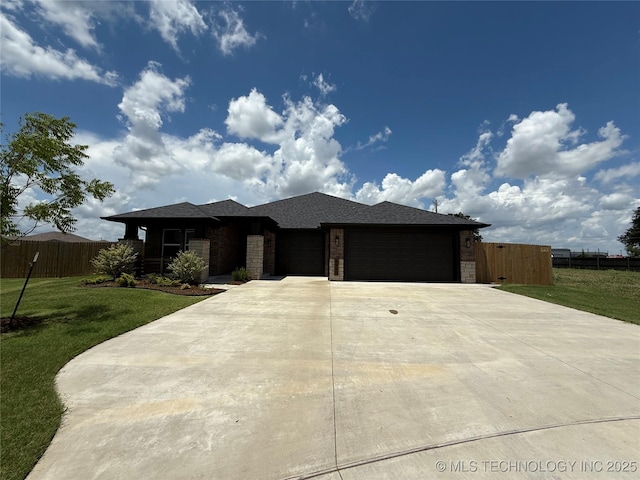 8940 E 161st Pl S, Bixby, OK 74008 - prairie-style home featuring a garage, concrete driveway, and brick siding