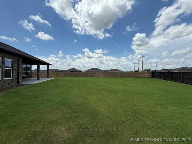 8940 E 161st Pl S, Bixby, OK 74008 - fenced backyard with a patio area