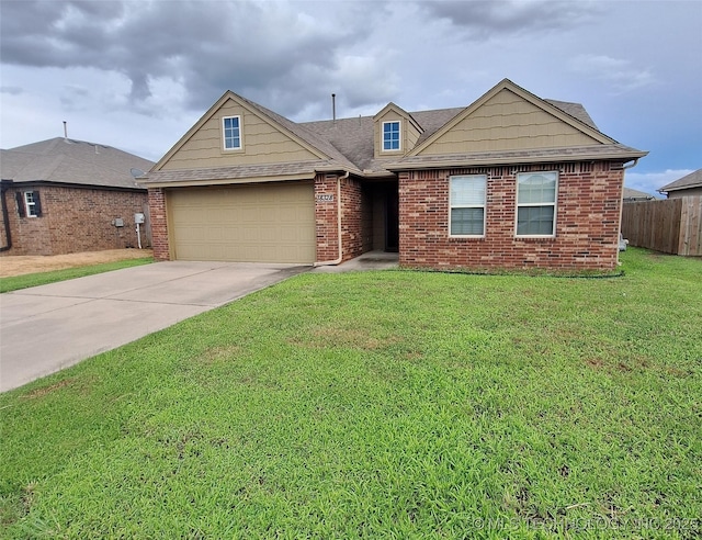 18328 E 42nd St, Tulsa, OK 74134 - view of front of property with a garage, concrete driveway, brick siding, and a shingled roof