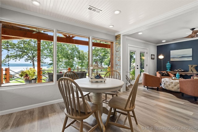 96164 S Strayhorn Heights Rd, Gore, OK 74435 - dining room featuring ornamental molding, french doors, a water view, light wood-style flooring, and recessed lighting