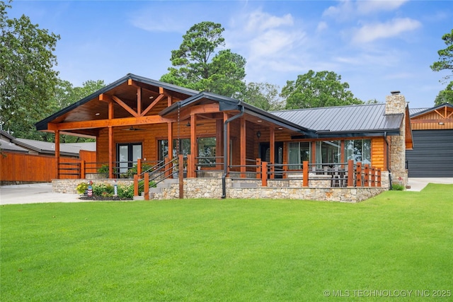 96164 S Strayhorn Heights Rd, Gore, OK 74435 - back of house with a chimney, a metal roof, french doors, and faux log siding