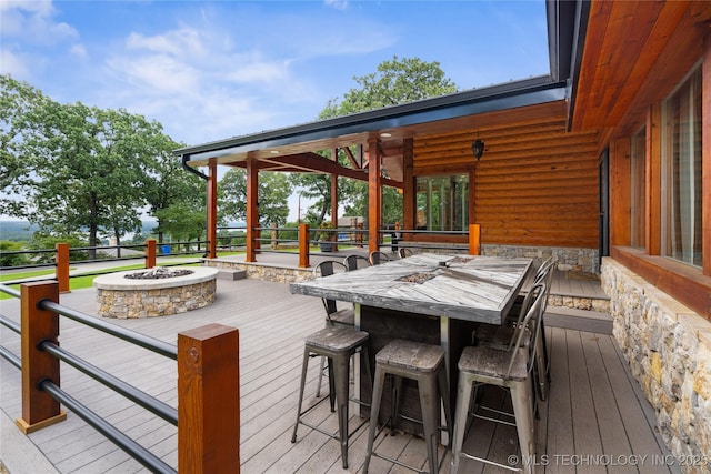 96164 S Strayhorn Heights Rd, Gore, OK 74435 - wooden deck featuring an outdoor fire pit