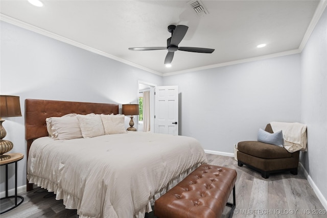 96164 S Strayhorn Heights Rd, Gore, OK 74435 - bedroom with wood finished floors, recessed lighting, a ceiling fan, and ornamental molding