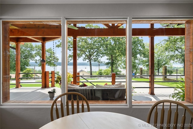 96164 S Strayhorn Heights Rd, Gore, OK 74435 - dining room featuring a water view and healthy amount of natural light