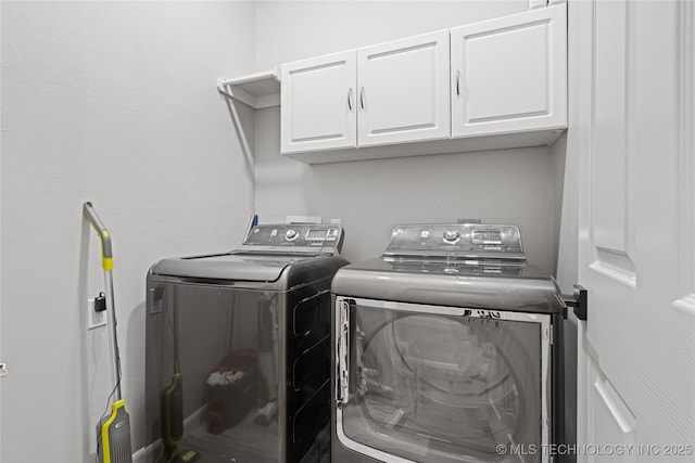 96164 S Strayhorn Heights Rd, Gore, OK 74435 - washroom featuring washer and dryer and cabinet space