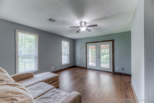 17542 W 1st St S, Sand Springs, OK 74063 - living area featuring french doors, wood finished floors, a ceiling fan, and a textured ceiling