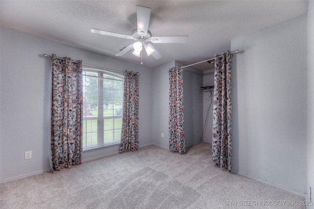 17542 W 1st St S, Sand Springs, OK 74063 - empty room with ceiling fan, carpet floors, and a textured ceiling