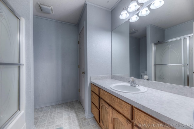 17542 W 1st St S, Sand Springs, OK 74063 - bathroom featuring vanity, an enclosed shower, and tile patterned floors