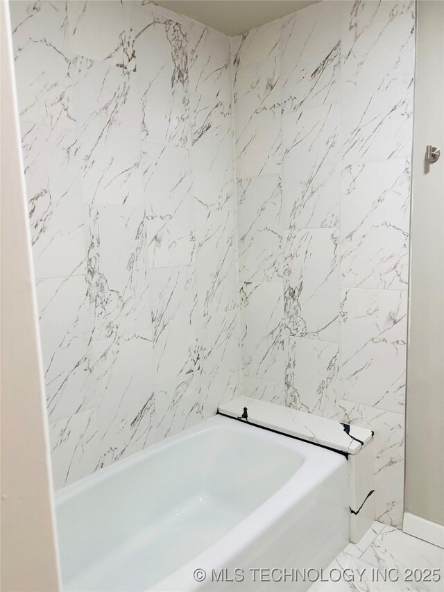 3622 S 82nd E Ave, Tulsa, OK 74145 - bathroom with a bath and marble finish flooring