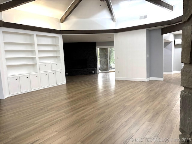 3622 S 82nd E Ave, Tulsa, OK 74145 - unfurnished living room featuring a fireplace and wood finished floors