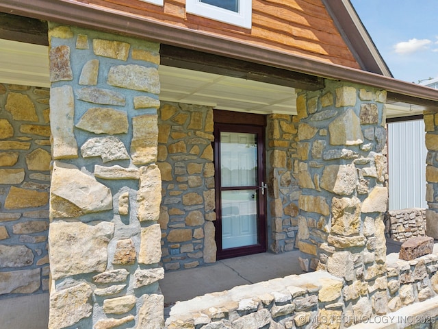 521 S Chickasaw Ave, Claremore, OK 74017 - view of exterior entry with stone siding