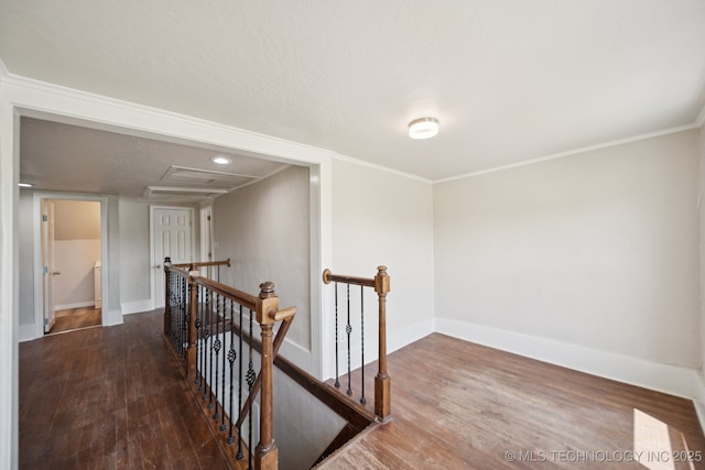 521 S Chickasaw Ave, Claremore, OK 74017 - corridor featuring an upstairs landing and wood finished floors