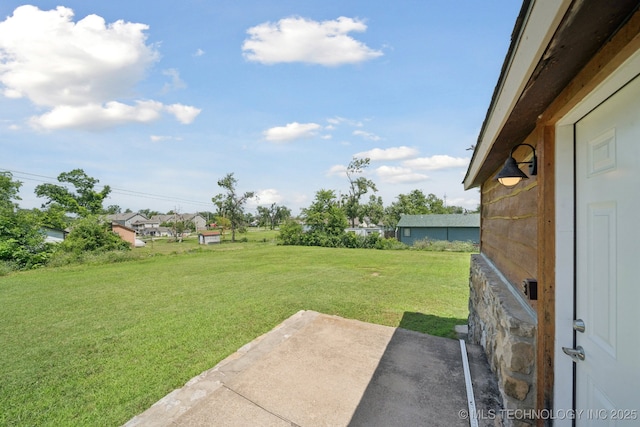 521 S Chickasaw Ave, Claremore, OK 74017 - view of green lawn featuring a patio area