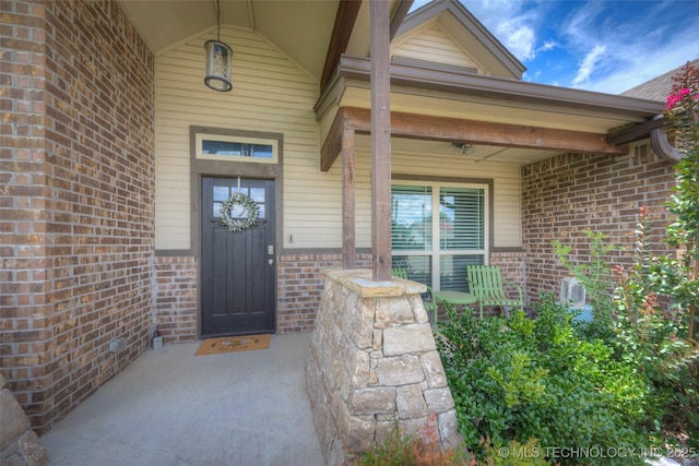 5440 Skylane Pl, Sand Springs, OK 74063 - property entrance featuring brick siding and covered porch