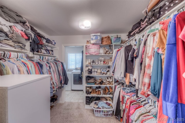 5440 Skylane Pl, Sand Springs, OK 74063 - spacious closet with washer / dryer and light carpet