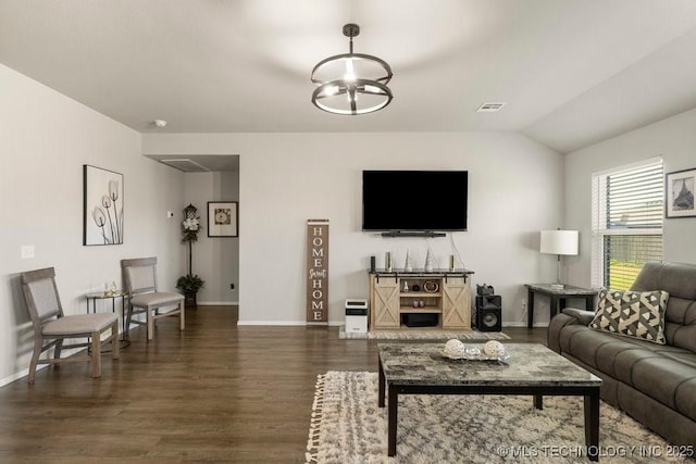 7506 E 159th St S, Bixby, OK 74008 - living room featuring dark wood-style floors and vaulted ceiling