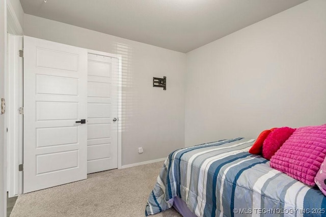 7506 E 159th St S, Bixby, OK 74008 - carpeted bedroom featuring baseboards
