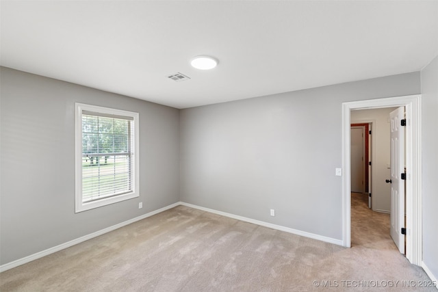 10295 E Rose Glen Dr, Claremore, OK 74019 - spare room with light colored carpet