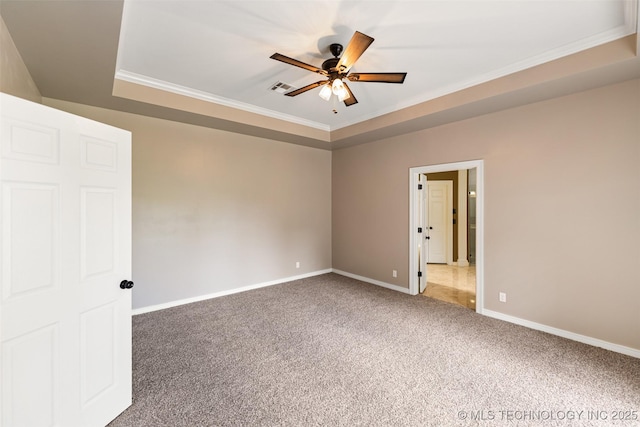 10295 E Rose Glen Dr, Claremore, OK 74019 - empty room with carpet floors, ceiling fan, crown molding, and a tray ceiling