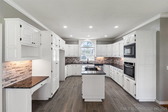 10295 E Rose Glen Dr, Claremore, OK 74019 - kitchen featuring appliances with stainless steel finishes, white cabinetry, dark wood-style flooring, decorative backsplash, and recessed lighting