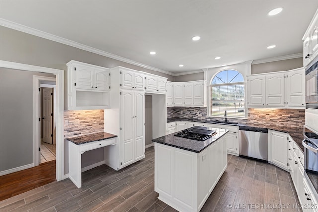 10295 E Rose Glen Dr, Claremore, OK 74019 - kitchen with stainless steel appliances, white cabinets, recessed lighting, backsplash, and dark wood finished floors