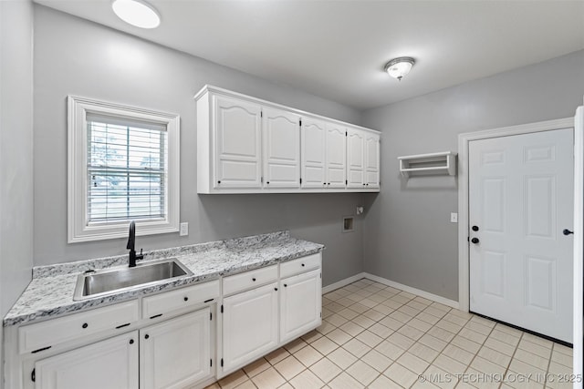 10295 E Rose Glen Dr, Claremore, OK 74019 - laundry room with cabinet space, hookup for a washing machine, and light tile patterned flooring