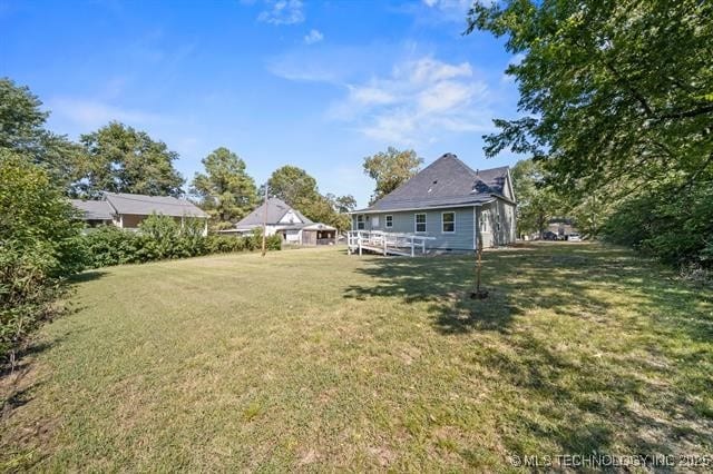 207 N Graham Ave, Wagoner, OK 74467 - view of green lawn