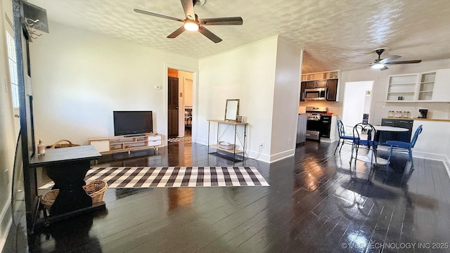 102 N Ash Ave, Tahlequah, OK 74464 - living area with a ceiling fan, a textured ceiling, and dark wood-style floors
