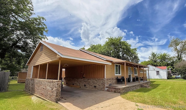 102 N Ash Ave, Tahlequah, OK 74464 - view of front of house with concrete driveway