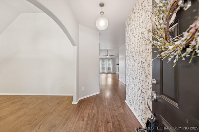 2105 W D Ct, Jenks, OK 74037 - foyer with arched walkways, wood finished floors, and ceiling fan
