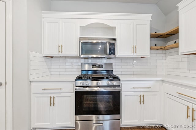 2105 W D Ct, Jenks, OK 74037 - kitchen featuring appliances with stainless steel finishes, open shelves, light countertops, and white cabinets