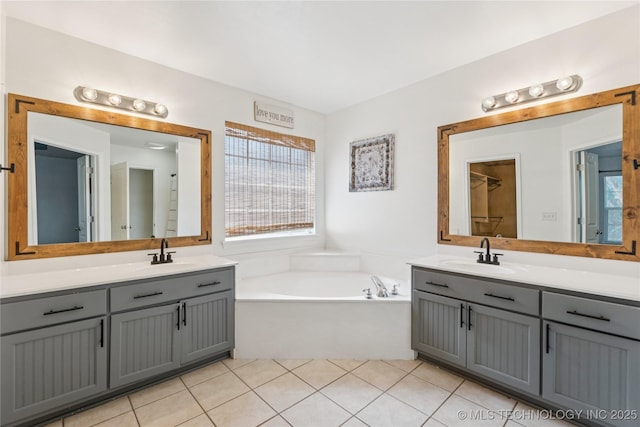 2105 W D Ct, Jenks, OK 74037 - bathroom with two vanities, a garden tub, and tile patterned flooring