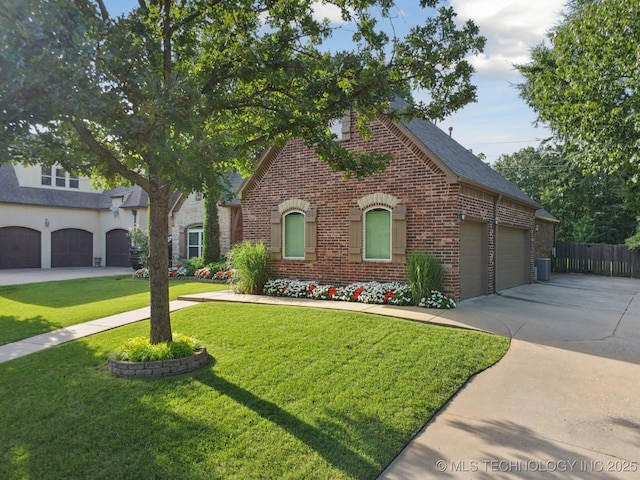 701 E 119th St, Jenks, OK 74037 - view of front of property with brick siding and concrete driveway