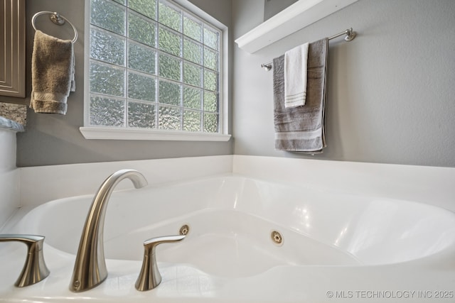 701 E 119th St, Jenks, OK 74037 - bathroom featuring a whirlpool tub