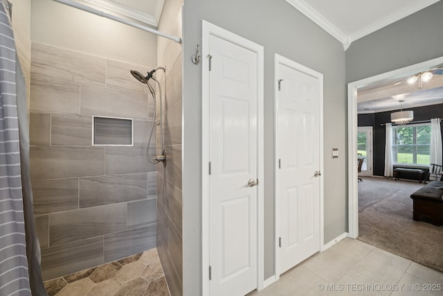 701 E 119th St, Jenks, OK 74037 - full bath featuring a tile shower, ornamental molding, and tile patterned floors
