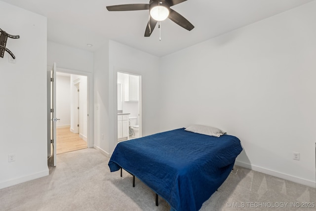 6684 E 128th St S, Bixby, OK 74008 - bedroom with light carpet, connected bathroom, and ceiling fan