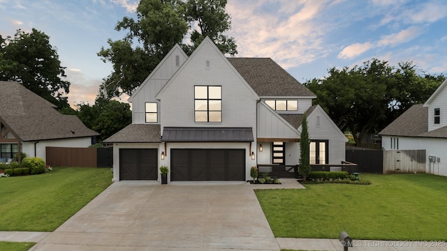 6684 E 128th St S, Bixby, OK 74008 - modern farmhouse with a shingled roof, an attached garage, a standing seam roof, concrete driveway, and board and batten siding