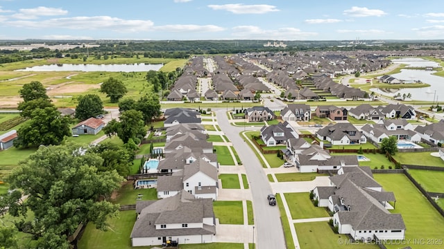 6684 E 128th St S, Bixby, OK 74008 - aerial perspective of suburban area featuring a large body of water