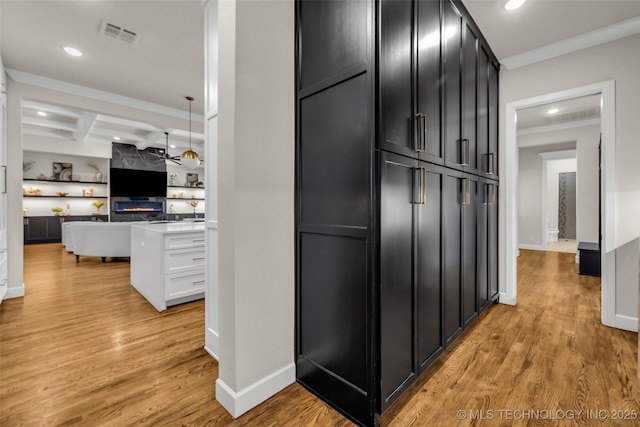 17076 S 31st E Ave, Mounds, OK 74047 - hallway featuring recessed lighting, light wood-style flooring, ornamental molding, and beam ceiling