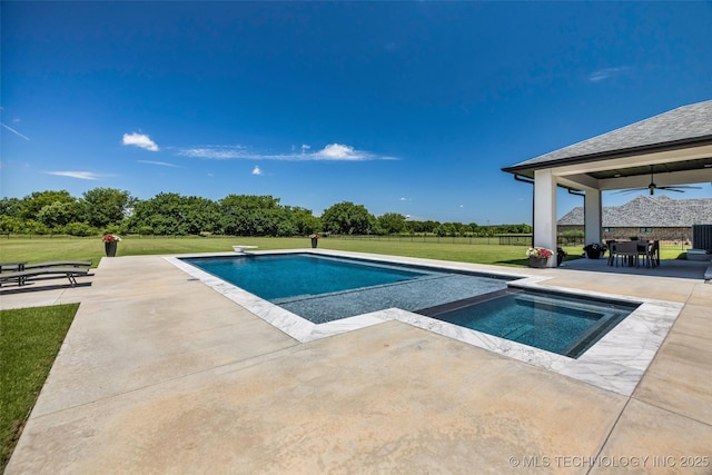 17076 S 31st E Ave, Mounds, OK 74047 - swimming pool featuring a lawn, a patio area, an in-ground hot tub, and ceiling fan