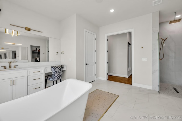 17076 S 31st E Ave, Mounds, OK 74047 - bathroom featuring a marble finish shower, a freestanding tub, vanity, marble finish flooring, and recessed lighting