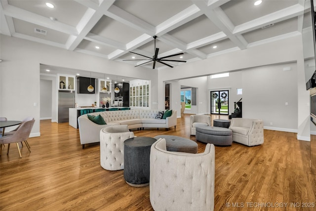 17076 S 31st E Ave, Mounds, OK 74047 - living room featuring light wood finished floors, coffered ceiling, beam ceiling, recessed lighting, and ceiling fan