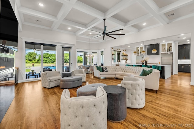 17076 S 31st E Ave, Mounds, OK 74047 - living room featuring coffered ceiling, a ceiling fan, light wood-type flooring, recessed lighting, and beam ceiling
