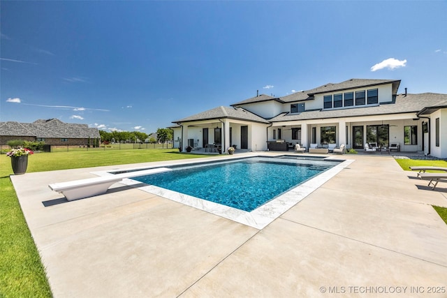 17076 S 31st E Ave, Mounds, OK 74047 - swimming pool with outdoor lounge area, a patio, and a diving board
